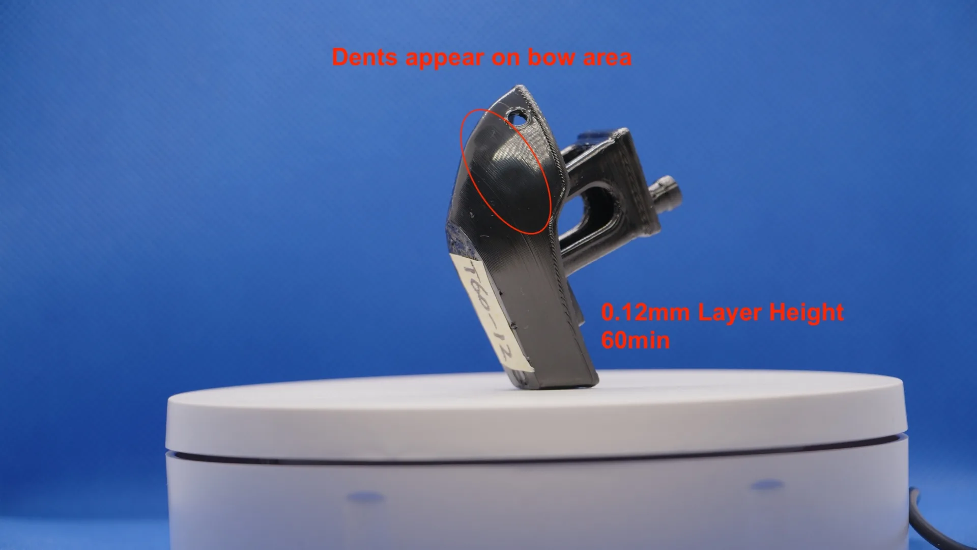 T60-12: visible bow dent at 60 min, 0.12 mm layer height